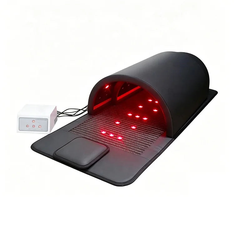 Black sauna dome capsule with padded headrest and external button controller