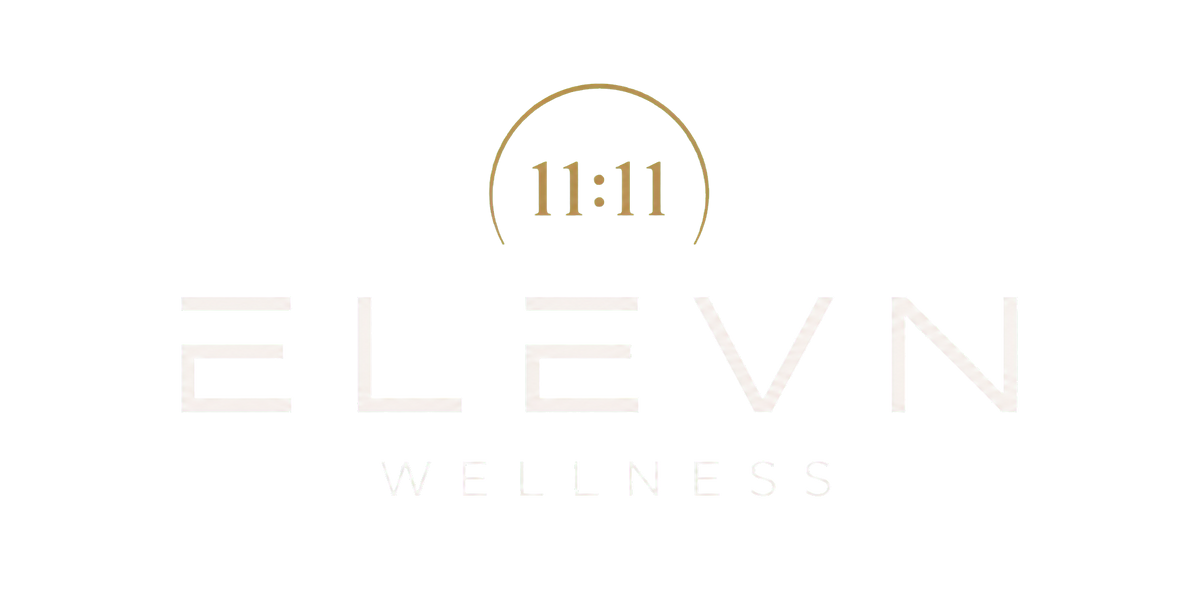 ELEVN Wellness logo in warm ivory and bronze